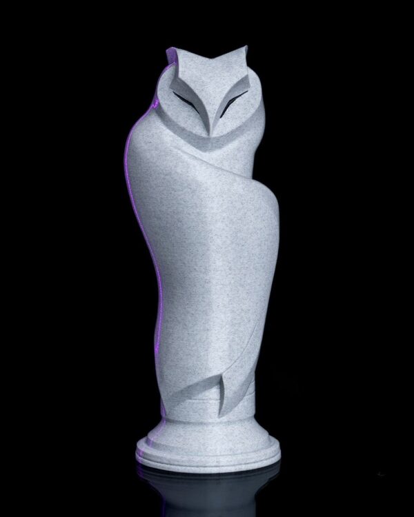 Elegant Owl Sculpture – Modern minimalist design in smooth, grey finish displayed on a black background.