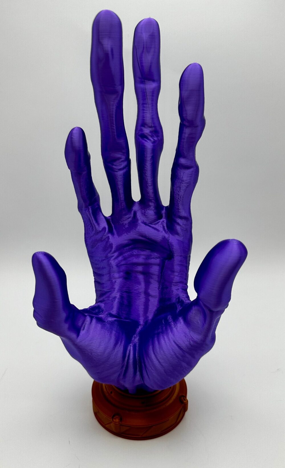 6-finger alien hand controller holder in purple for gaming setups. Perfect for displaying or organizing your game controllers.