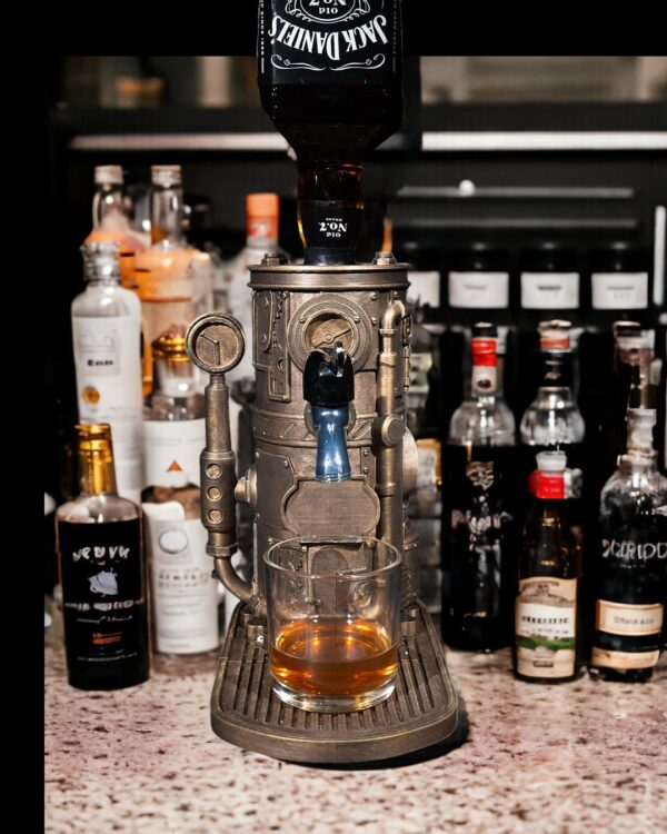 A Steampunk-style drink dispenser on a bar counter pouring whiskey into a glass, surrounded by various liquor bottles.