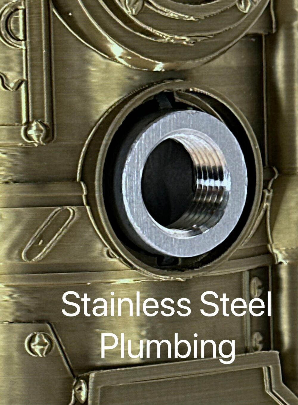 Close-up of the stainless steel plumbing part on the Steampunk Drink Dispenser product.