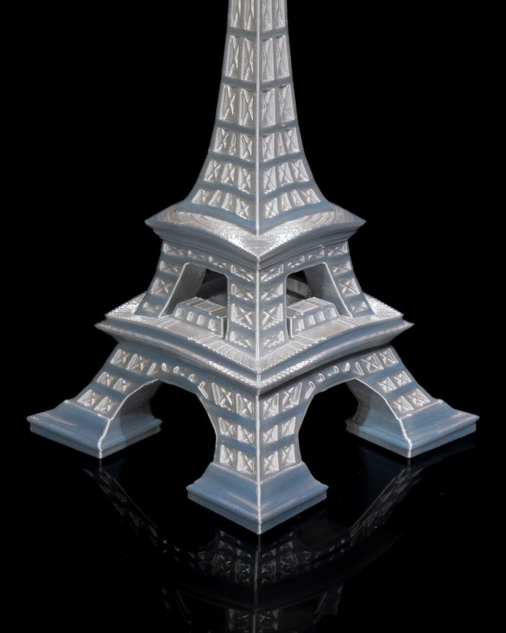 Eiffel Tower Home Decor Model in silver on a black background, ideal for living room, office, or bedroom decoration.