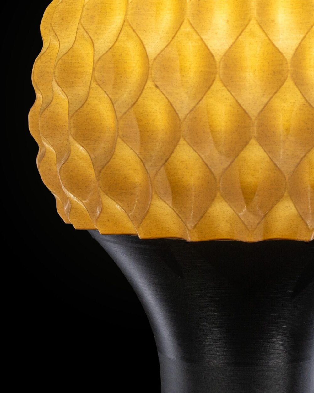 Close-up of Reverse Diamond Table Lamp in yellow, showcasing its unique textured pattern and modern design.