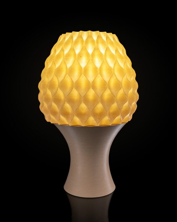 Reverse Diamond Table Lamp in yellow with a unique textured design and modern base, ideal for contemporary home lighting.